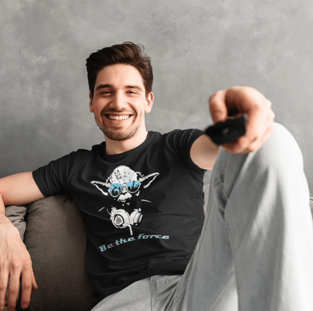 Guy with custom T-shirt and yoda from Star Wars